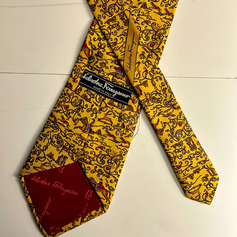 Ferragamo tie , great with suits, can be used for multiple occasions.